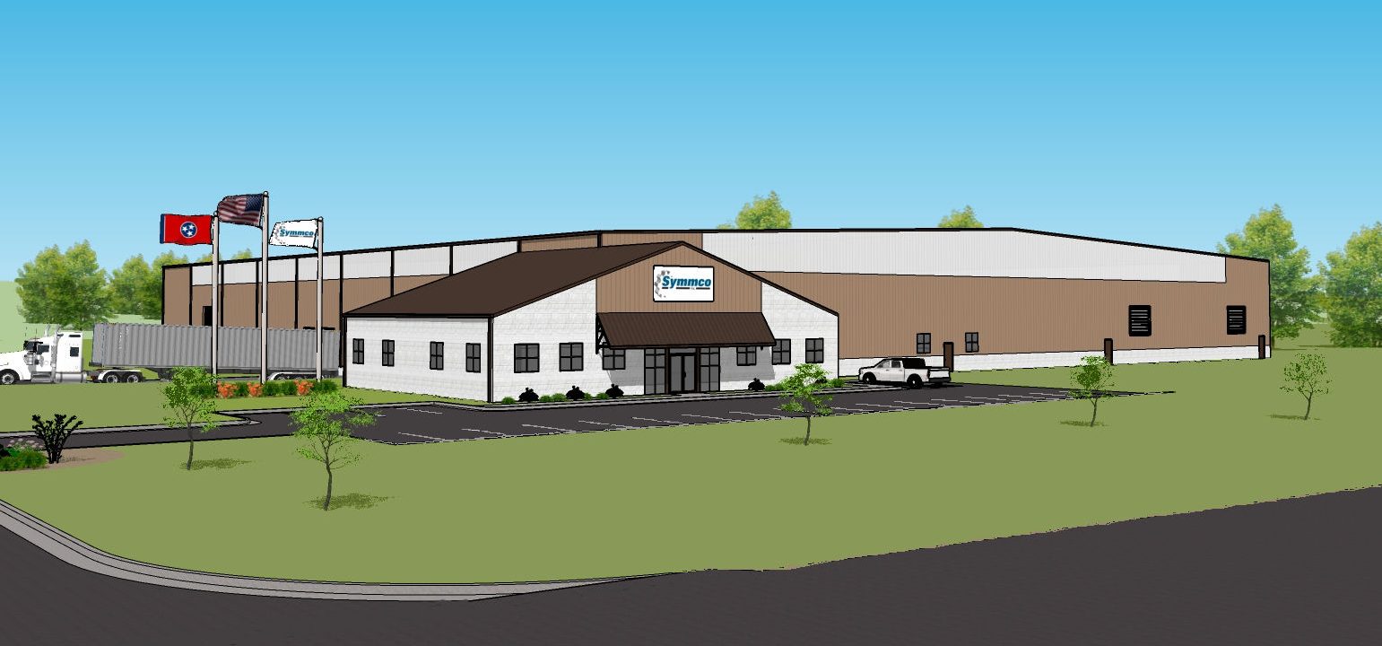 A digital rendering of a large industrial building with a white and brown exterior, parking lot with cars, flagpoles, green lawn, and surrounding trees under a blue sky.