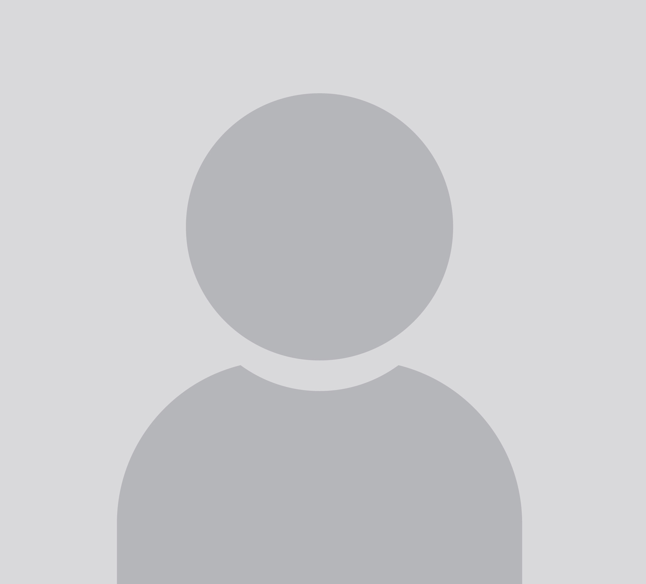 A gray, generic user icon on a light gray background, depicting a simple silhouette of a head and shoulders.