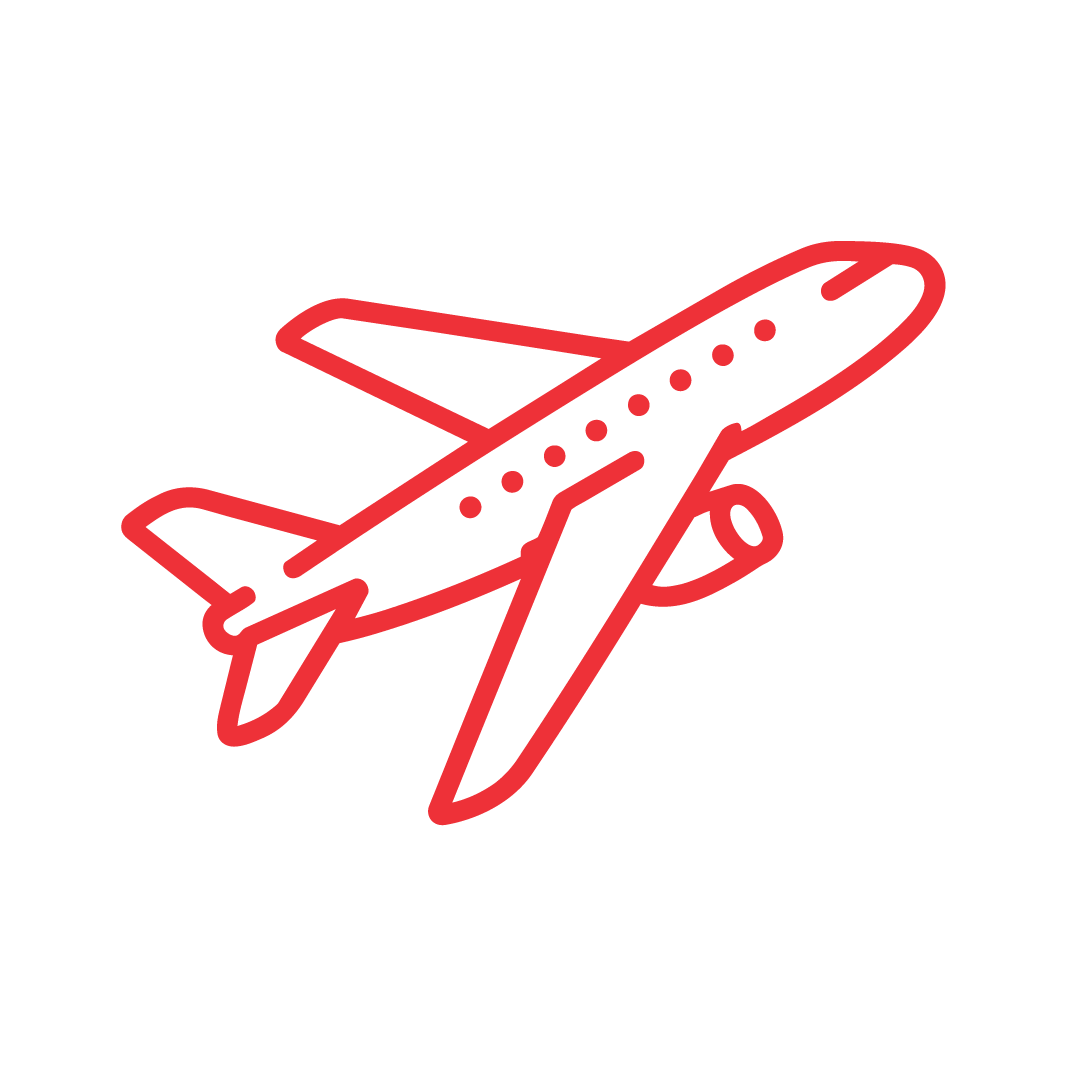 A simple red outline drawing of an airplane flying, shown from the side and slightly above, on a plain white background.