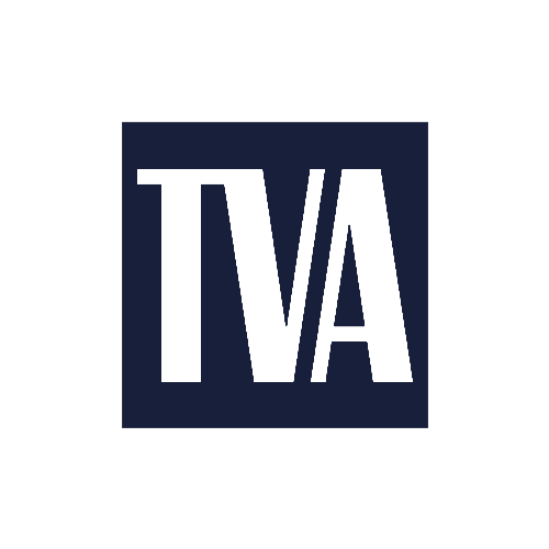 A navy blue square with the white capital letters "TVA" in a bold, modern font centered inside the square. The background is light gray.